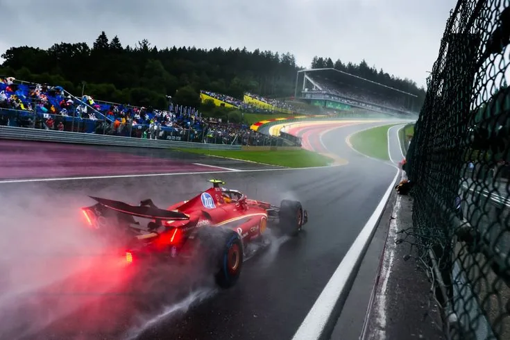 A Ferrari through the spray at Spa